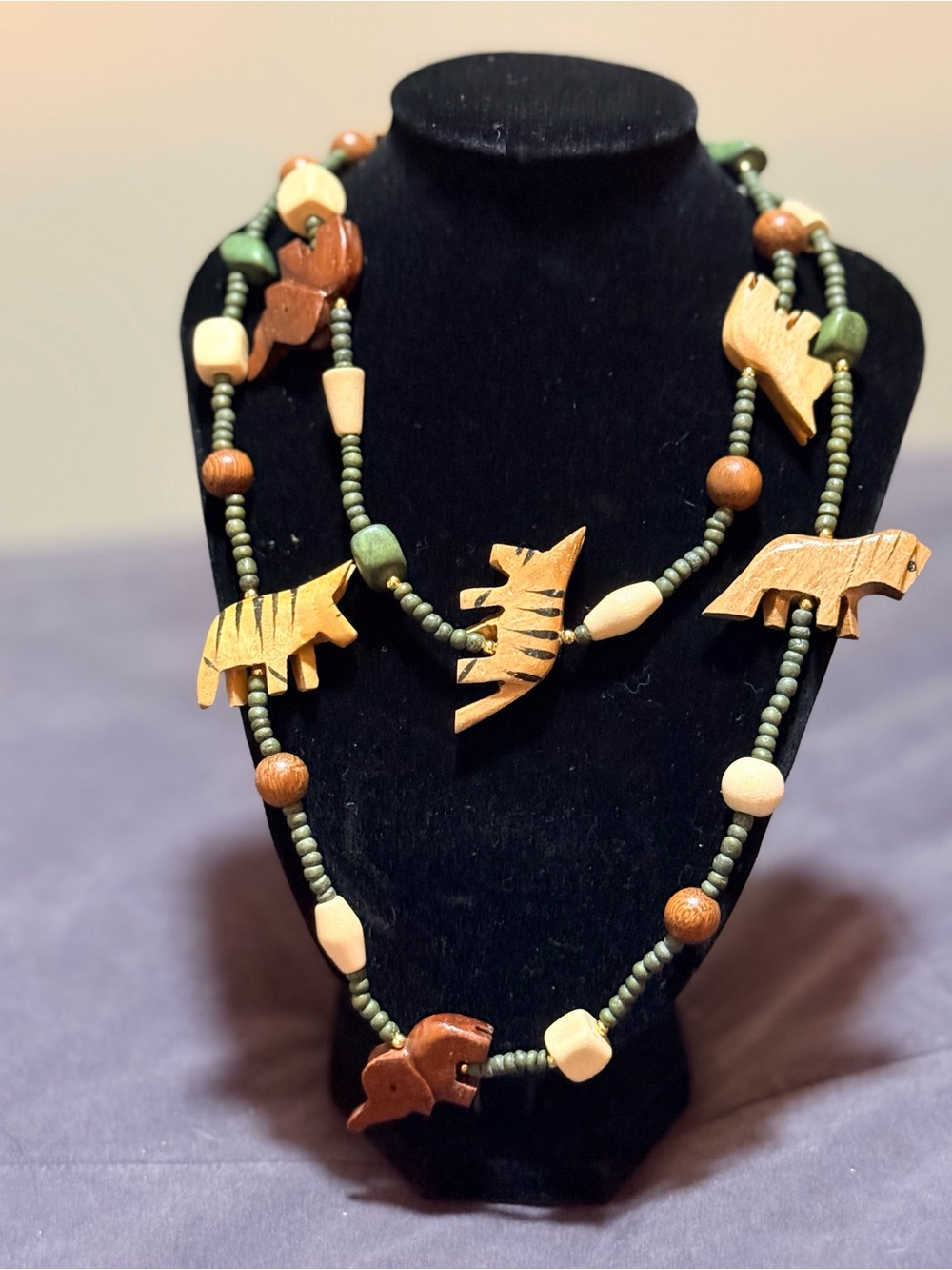 Handcrafted Wooden Animal Necklace in Green and Natural Wood Tones